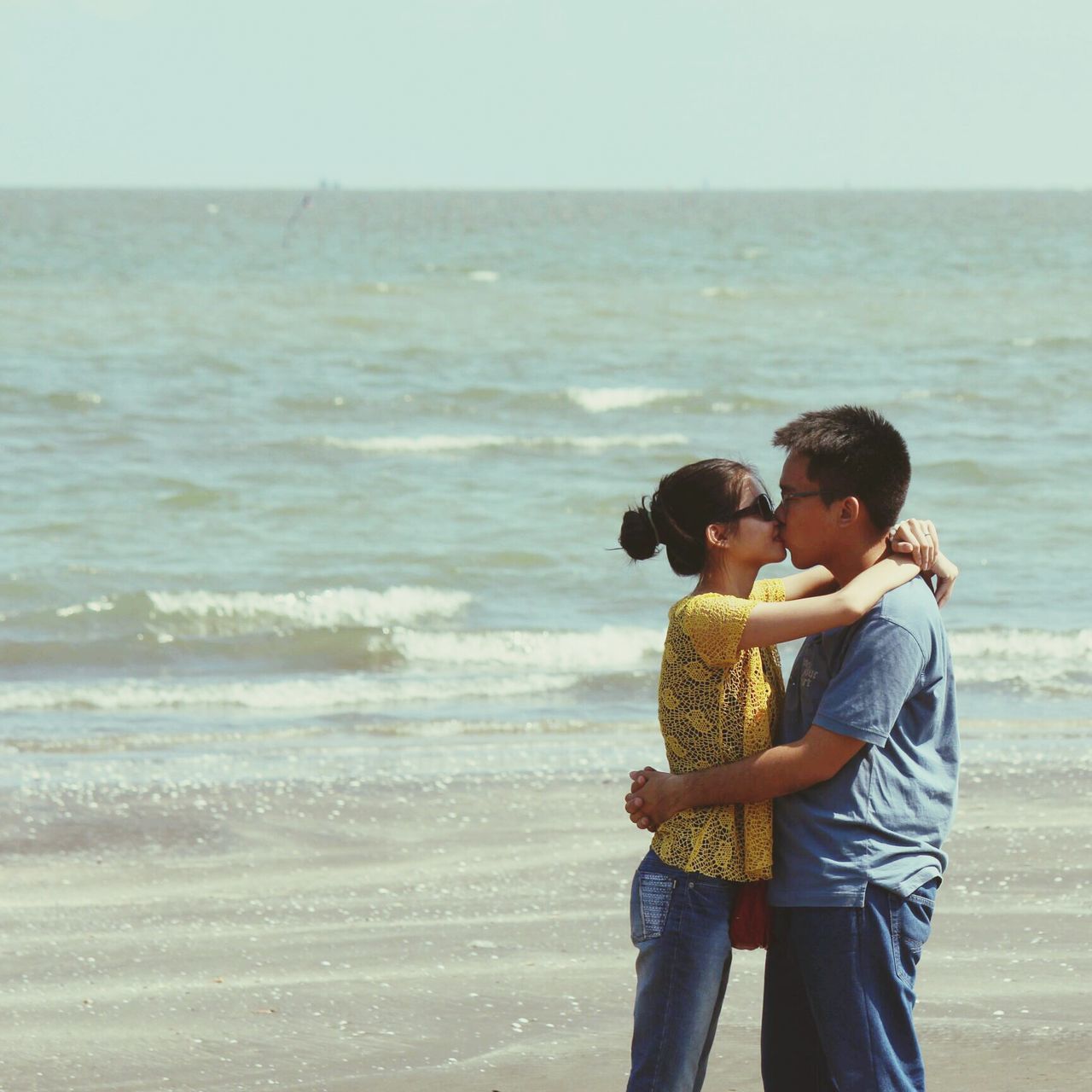 sea, beach, water, lifestyles, leisure activity, horizon over water, shore, casual clothing, standing, young men, rear view, person, three quarter length, togetherness, vacations, bonding, full length