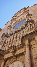 Low angle view of historical building against clear sky