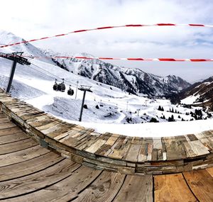 High angle view of overhead cable cars above over ski resort