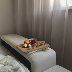 Breakfast in bedroom by curtain at home