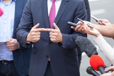 Close-up of hands holding mobile phone