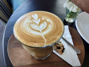 The concentration and softness of the coffee latte and the beauty of the latte art. coffee lover.