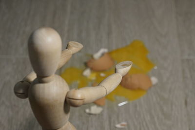 Close-up of figurine on table