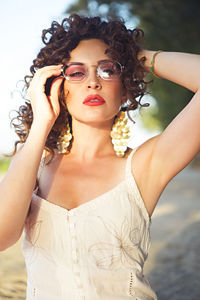 Portrait of beautiful woman wearing sunglasses