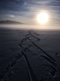Scenic view of beach against sky during sunset