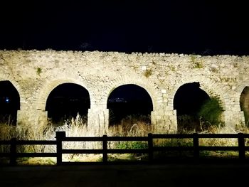 View of historic building at night