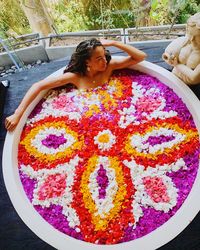 High angle view of woman with multi colored candies