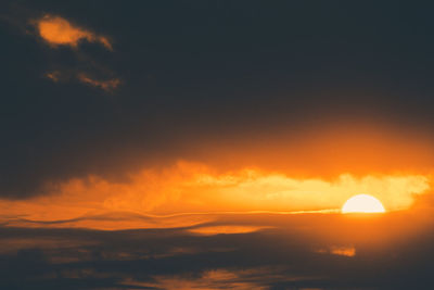 Low angle view of dramatic sky during sunset