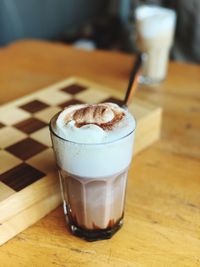 Close-up of coffee cup on table