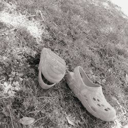 High angle view of shoes on grass