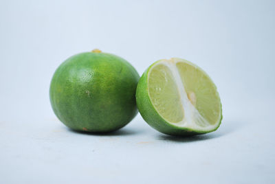 Close-up of green fruits on table