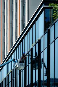 Reflection of building on glass window