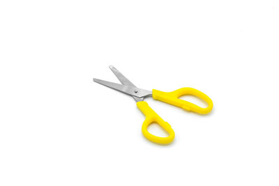 High angle view of yellow flag against white background
