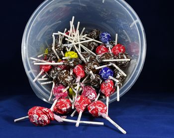 Close-up of strawberries on table against black background