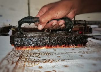 Close-up of person preparing food