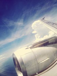 Airplane wing over landscape