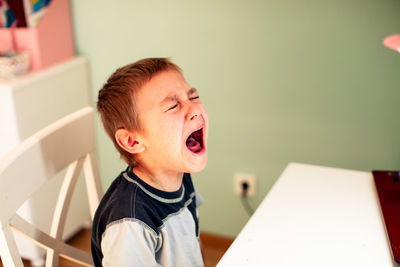 Portrait of boy at home