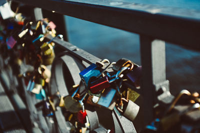 Close-up of padlocks on railing