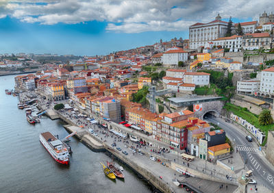 High angle view of buildings in city against sky