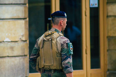 Full length of man standing in building