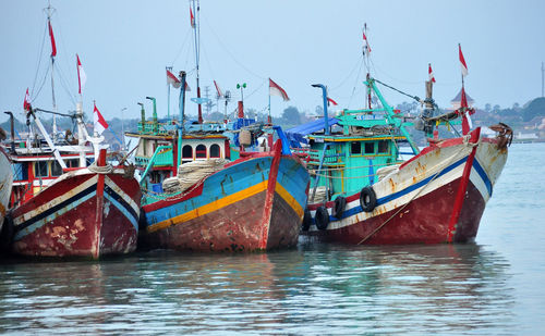 Boats in harbor