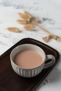 High angle view of coffee cup on table