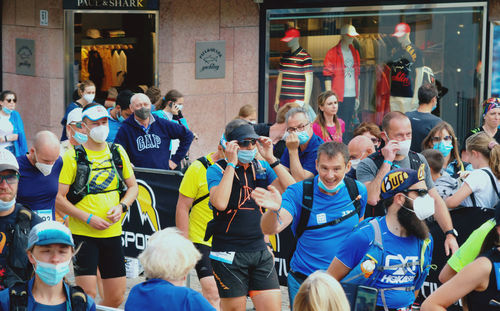 Group of people on street in city