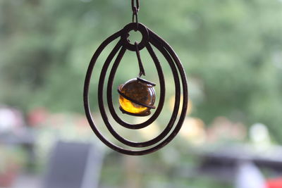 Close-up of metal hanging outdoors