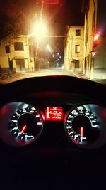 Close-up of illuminated car at night