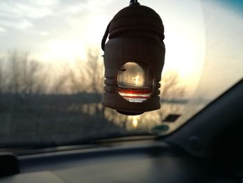 Close-up of car against sky