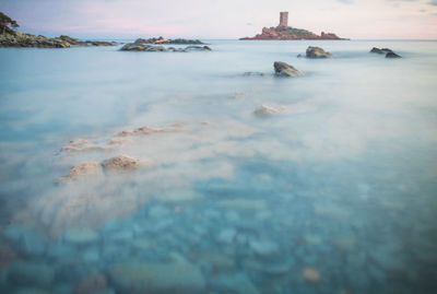 L'île d'or with its tower in front of the dramont beach in saint-raphaël