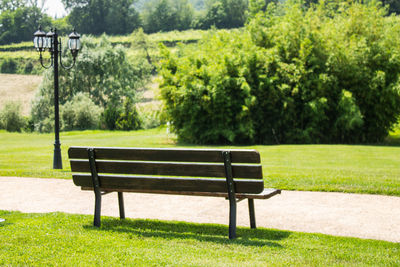 Empty bench in park