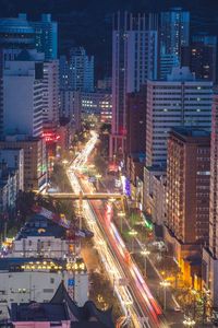 High angle view of illuminated buildings at night