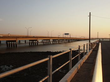 View of jetty on pier at dusk