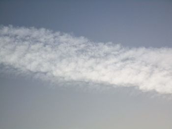 Low angle view of vapor trail in sky