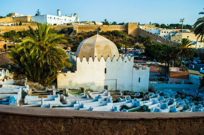 View of temple against clear blue sky