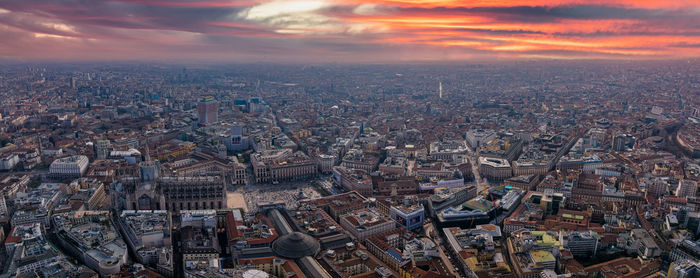 Aerial view of piazza duomo in front of the gothic cathedral in the center.