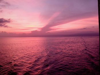 Scenic view of sea at sunset