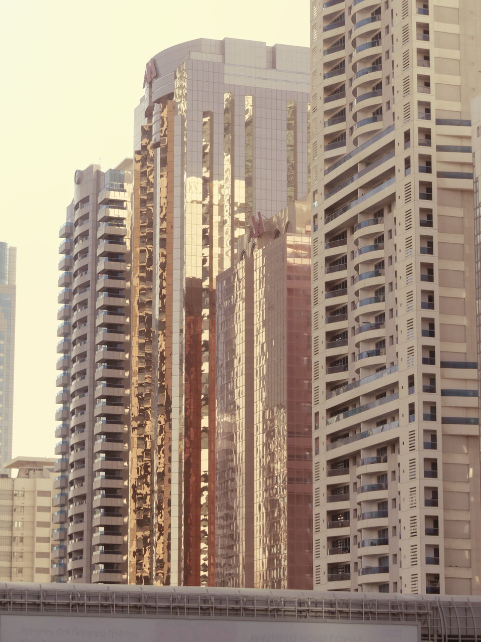 LOW ANGLE VIEW OF BUILDINGS AGAINST CLEAR SKY