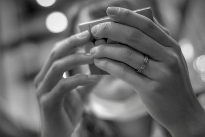 Close-up of woman holding hands