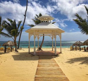 Built structure on beach against sky