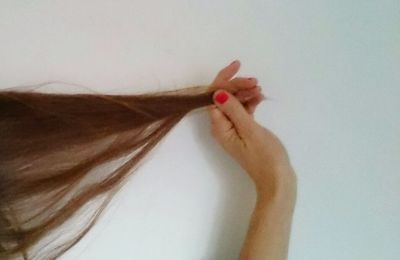 Cropped image of woman against white background