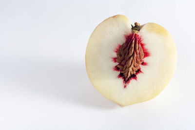 High angle view of apple on white background