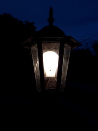 Low angle view of illuminated building against sky
