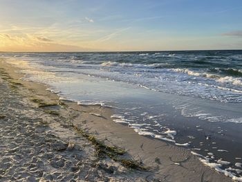 Scenic view of sea against sky during sunset