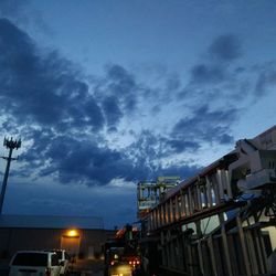 View of street light against cloudy sky