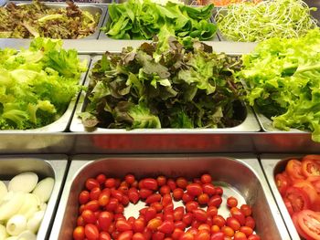 High angle view of chopped fruits for sale at market stall