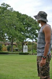 People walking on grassy field