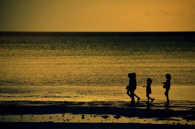 Scenic view of sea at sunset