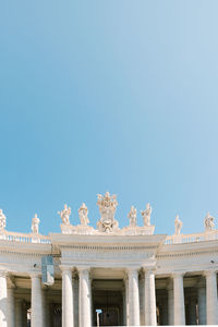 Low angle view of building against blue sky